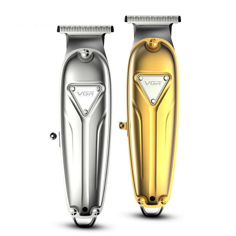 ماشین اصلاح وی جی ار مدل VGR V-056 - داشتن یک ماشین اصلاح با کیفیت و خوب برای هر فردی چه آرایشگر و چه یک فرد معمولی یکی از ضروریات محسوب می گردد. این روزها دیگر کمتر کسی را میبینید که با تیغ اصلاح کند. اگر میخواهید که همیشه زیبا دیده شوید و مورد تحسین دیگران قرار بگیرید داشتن این ماشین اصلاح واجب است. برند VGR با کیفیت فوق العاده و طرا ...